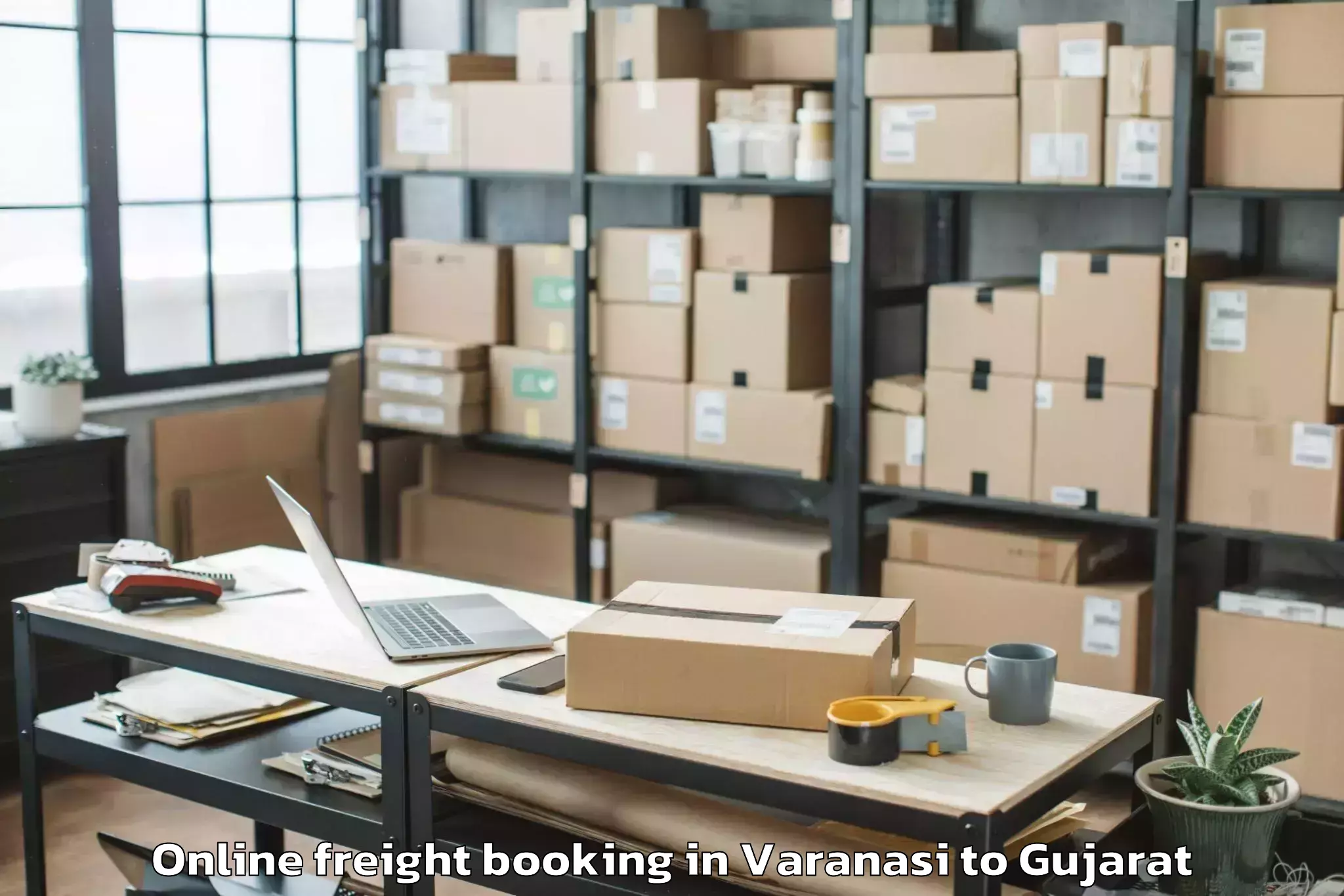 Get Varanasi to Hansot Online Freight Booking